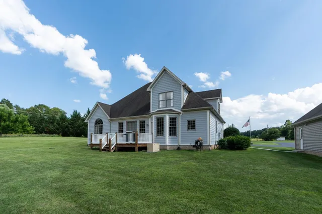 a view of a house with a big yard