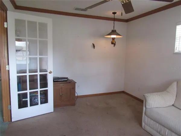 a empty room with windows