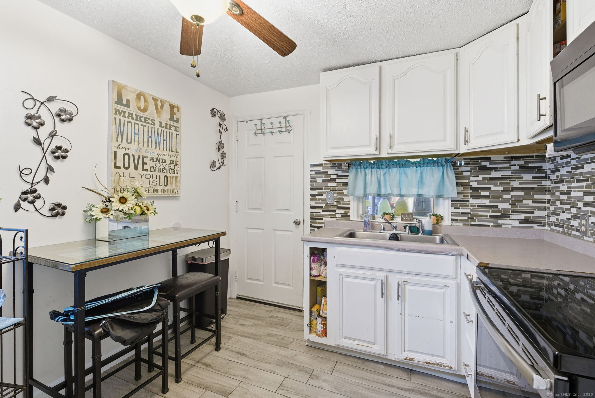 55 Alexander Road New Britain, CT 06053 - Photo 19 of 38 a kitchen with stainless steel appliances kitchen island granite countertop a sink and cabinets