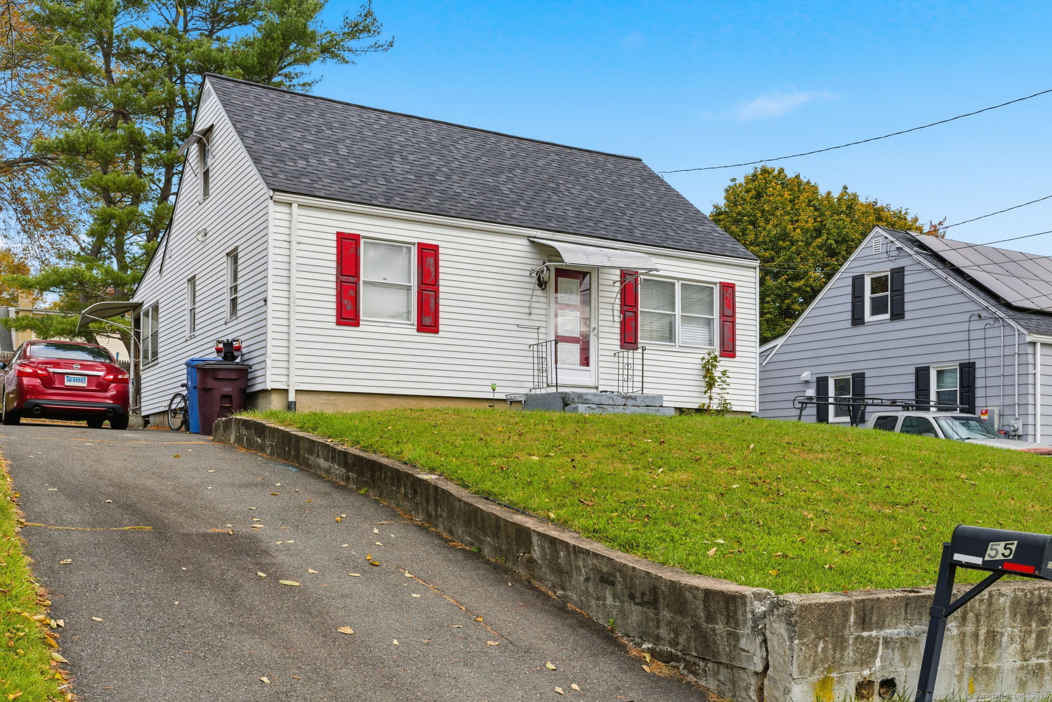 55 Alexander Road New Britain, CT 06053 - Photo 2 of 38 a view of a house with a yard and sitting area