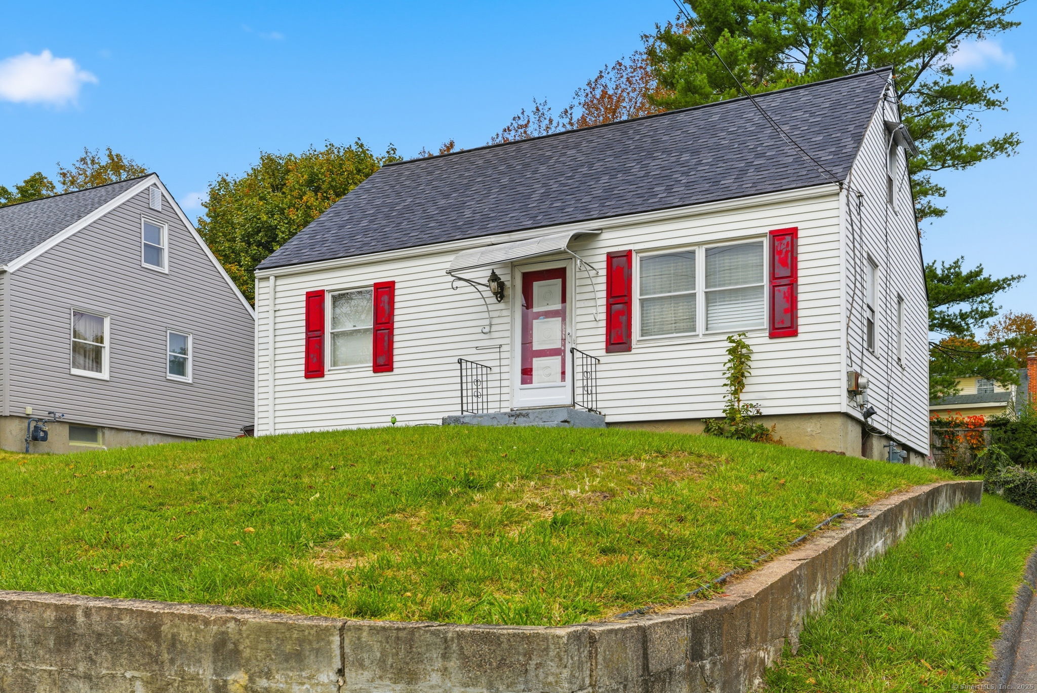 55 Alexander Road New Britain, CT 06053 - Photo 3 of 38 a view of a house with a yard
