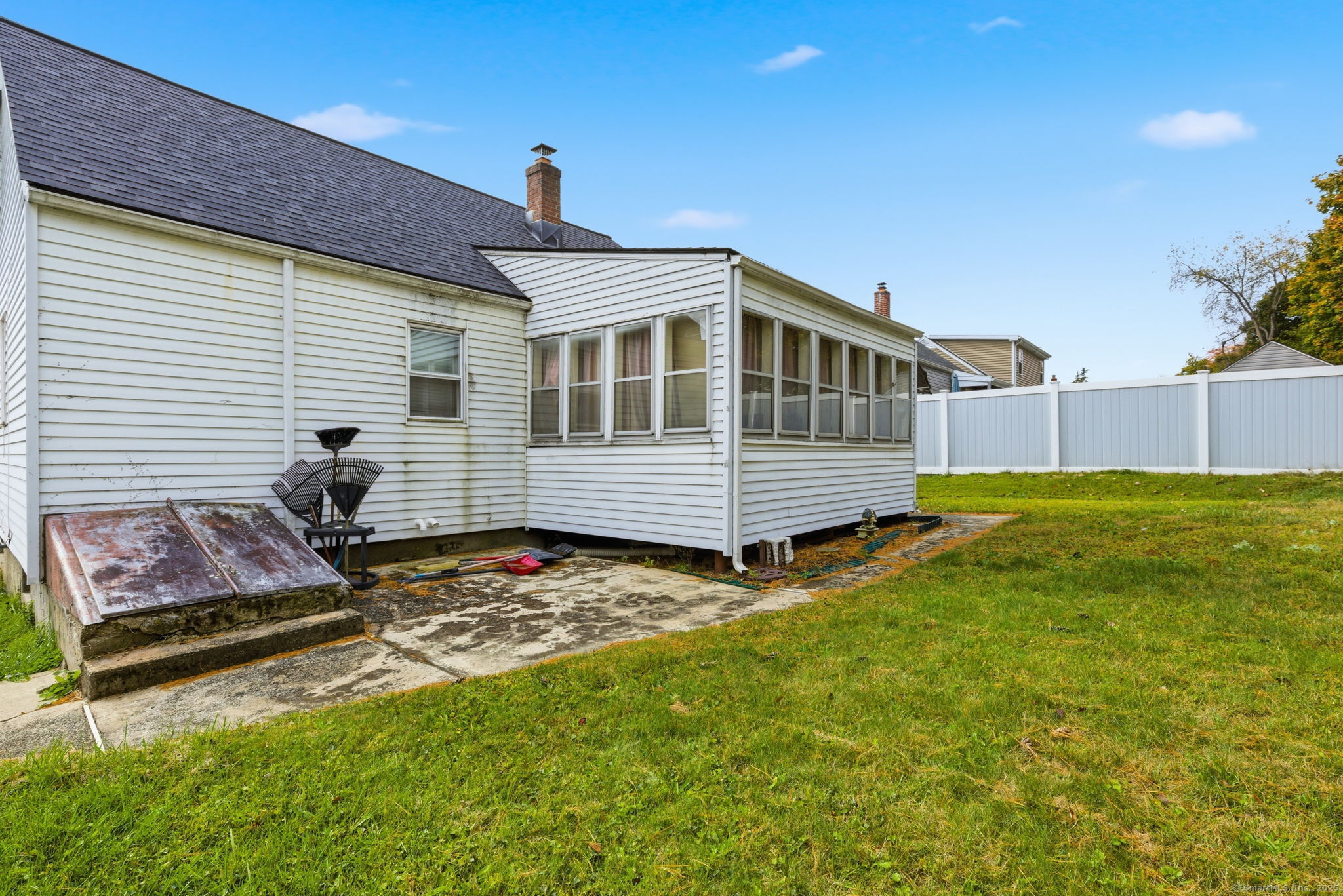 55 Alexander Road New Britain, CT 06053 - Photo 31 of 38 a front view of house with yard and trees in the background