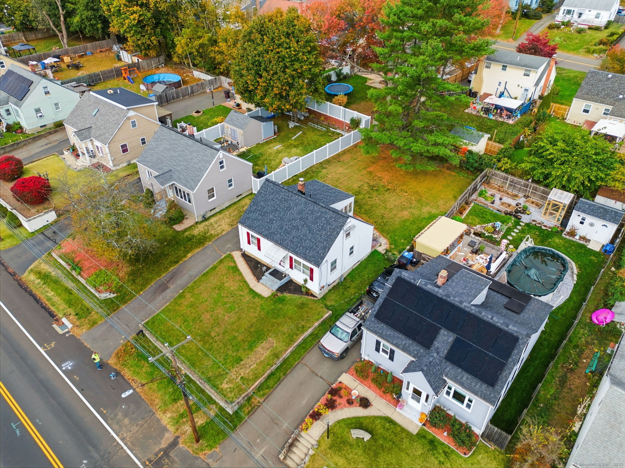 55 Alexander Road New Britain, CT 06053 - Photo 34 of 38 an aerial view of a house with a swimming pool