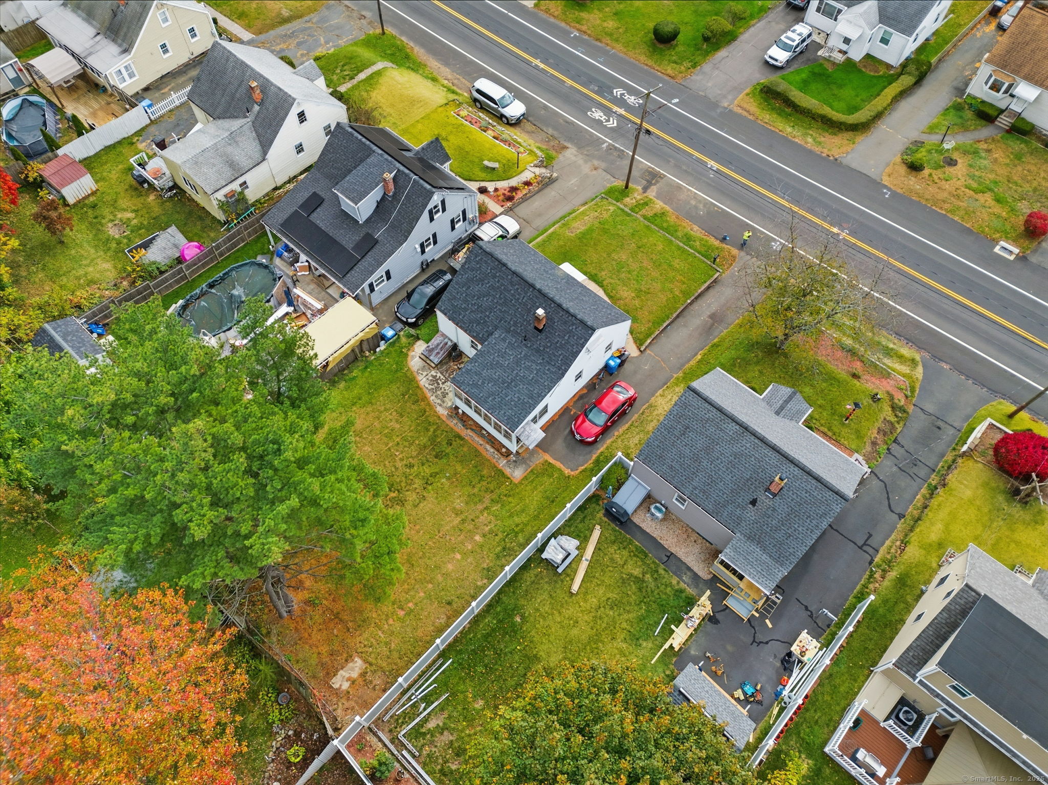 55 Alexander Road New Britain, CT 06053 - Photo 37 of 38 an aerial view of a house with a swimming pool