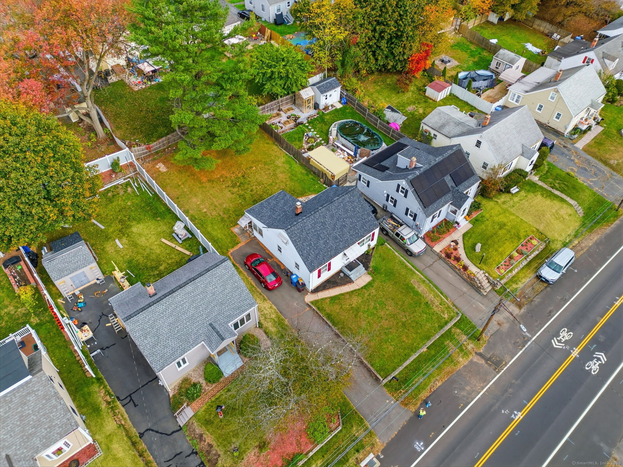 55 Alexander Road New Britain, CT 06053 - Photo 38 of 38 an aerial view of a house with a yard and tennis court