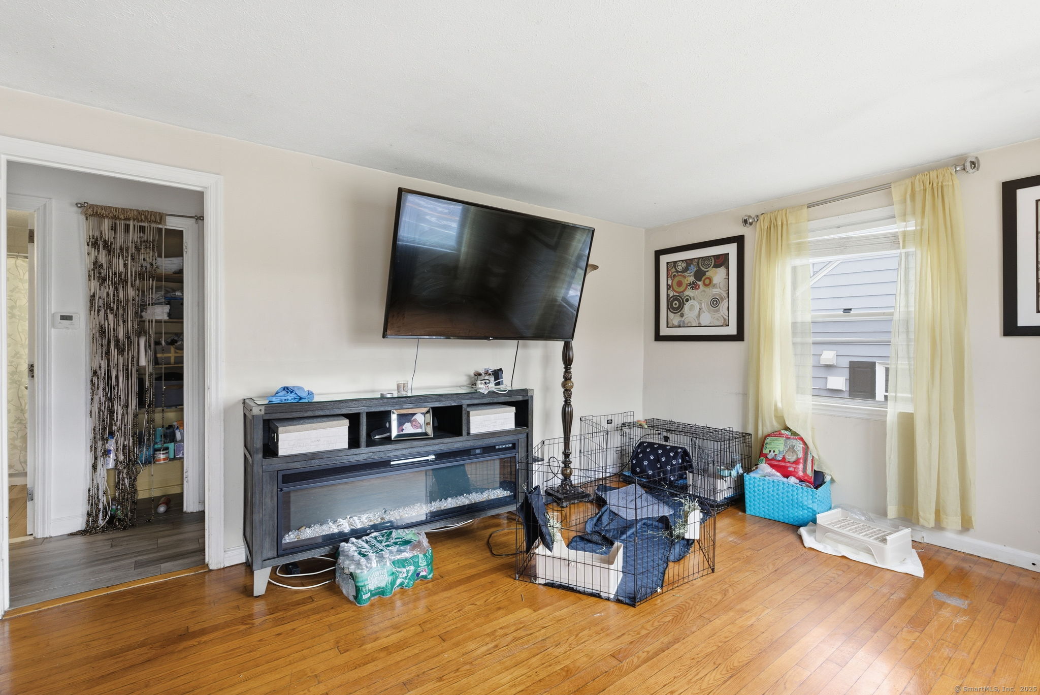 55 Alexander Road New Britain, CT 06053 - Photo 4 of 38 a living room with furniture and a flat screen tv