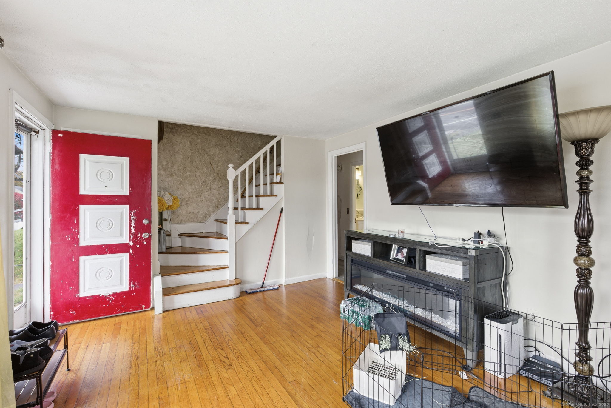 55 Alexander Road New Britain, CT 06053 - Photo 5 of 38 a living room with furniture and a flat screen tv
