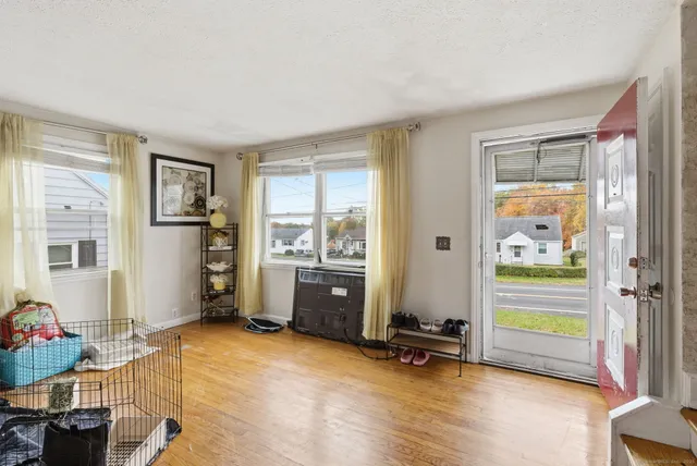 a view of room with workspace and a window