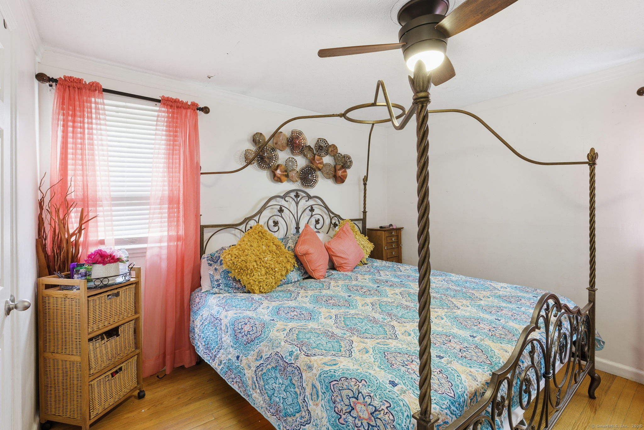 55 Alexander Road New Britain, CT 06053 - Photo 8 of 38 a bedroom with a bed a dresser and potted plants