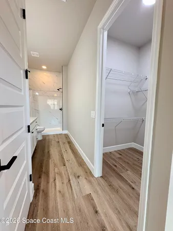 a bathroom with a tub and shower