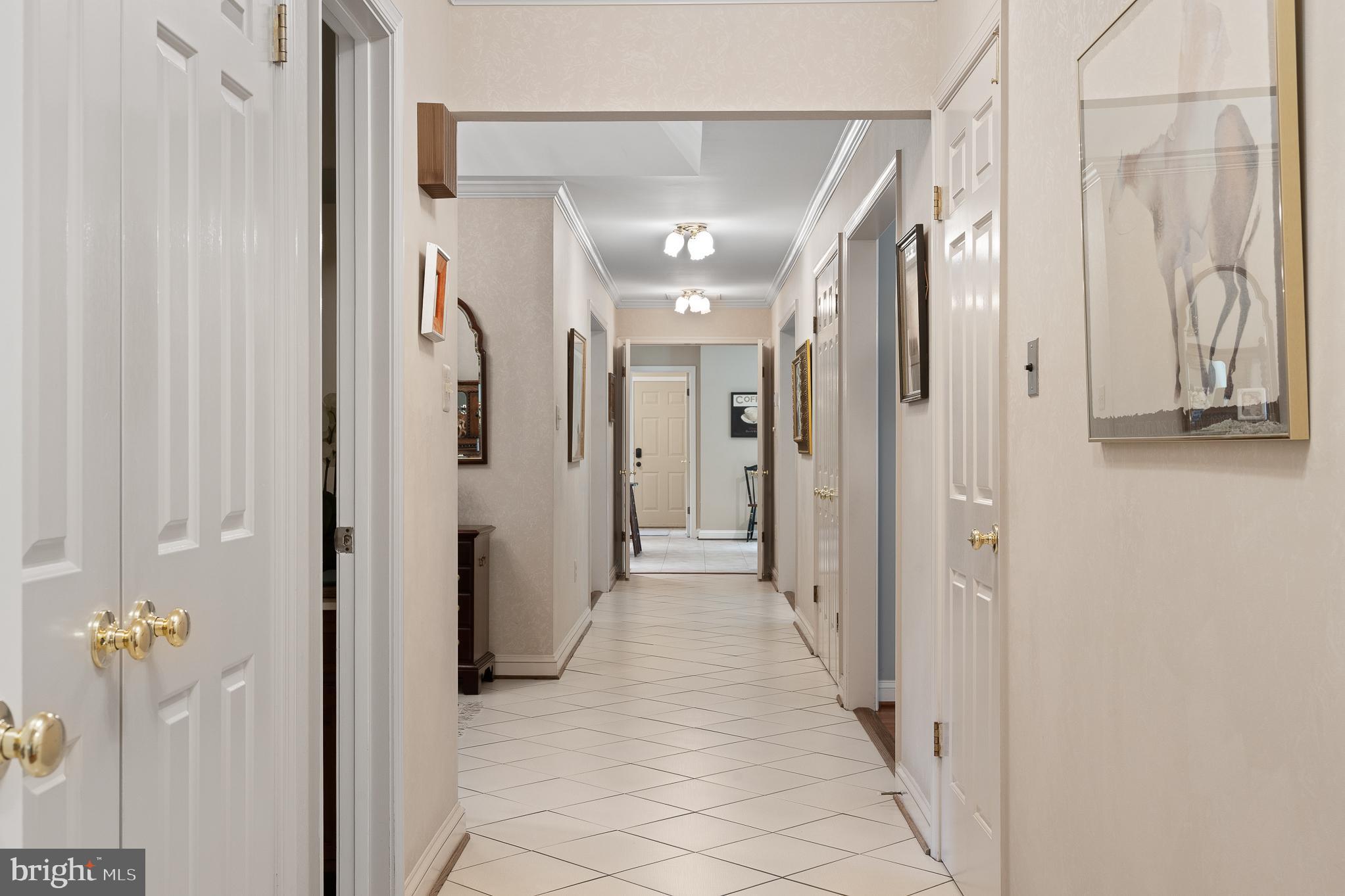 11301 Crossing Glen Court Potomac, MD 20854 - Photo 103 of 136 a view of a hallway with wooden shelves