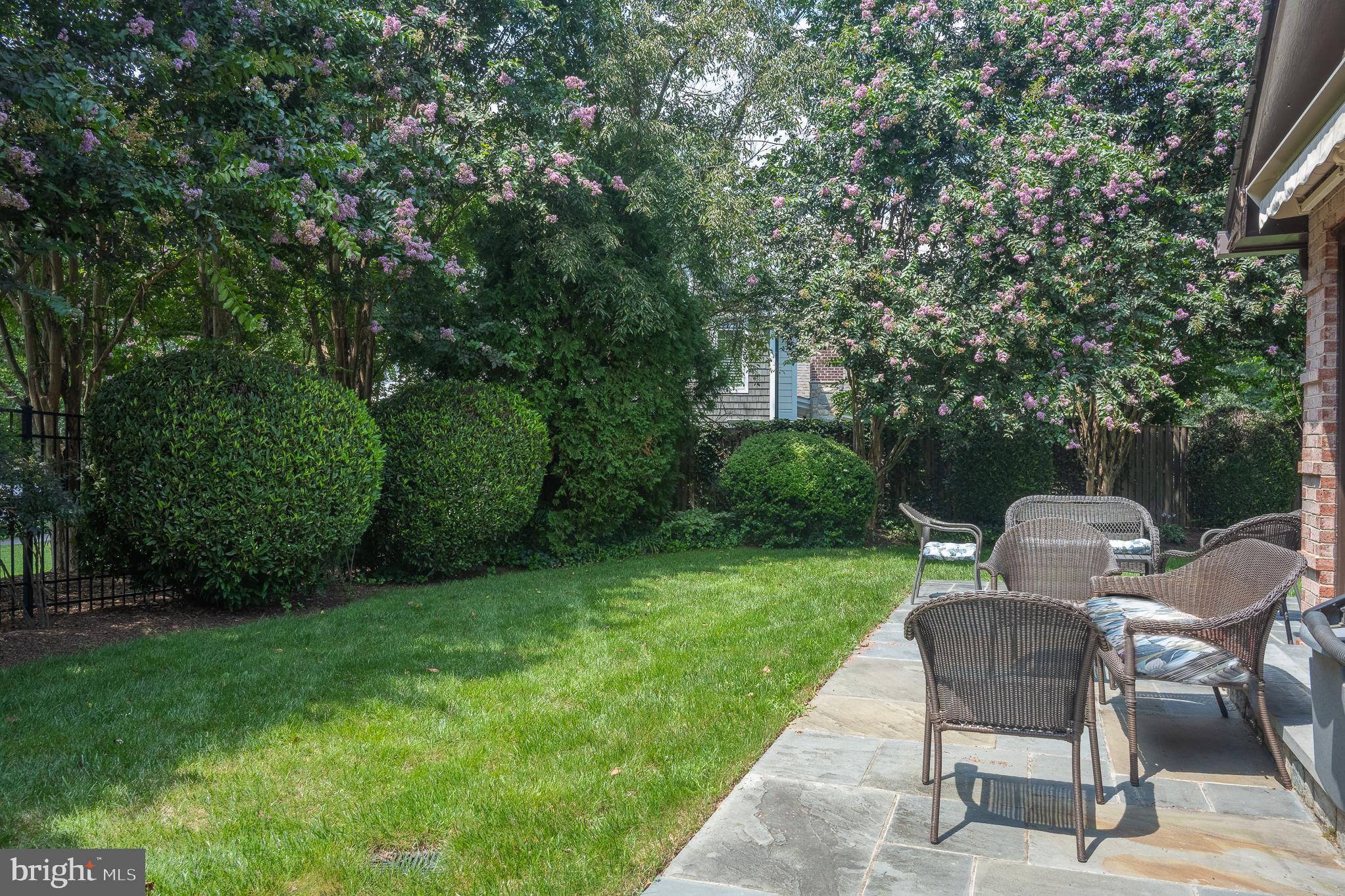 11301 Crossing Glen Court Potomac, MD 20854 - Photo 120 of 136 a view of a chairs and table in the garden