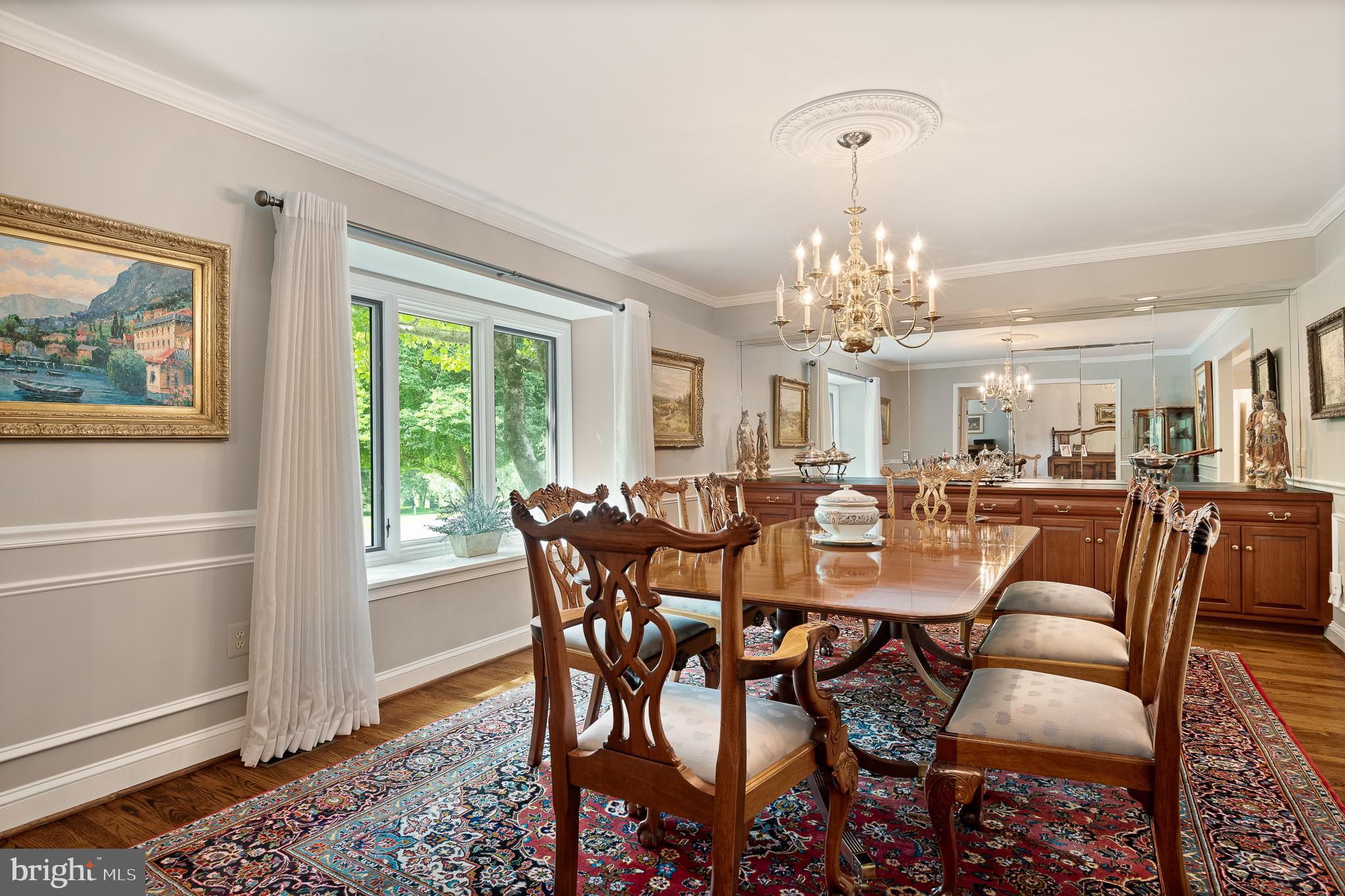 11301 Crossing Glen Court Potomac, MD 20854 - Photo 14 of 136 a view of a dining room with furniture window and outside view