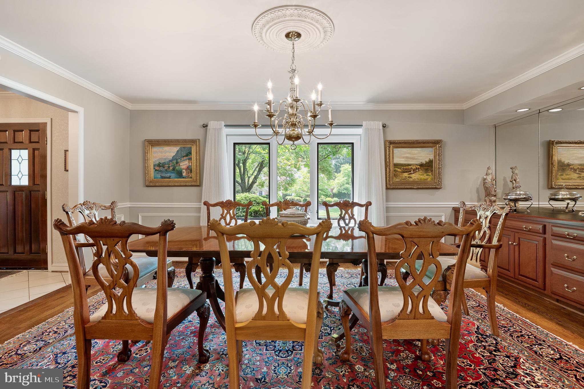 11301 Crossing Glen Court Potomac, MD 20854 - Photo 15 of 136 a view of a dining room with furniture window and outside view