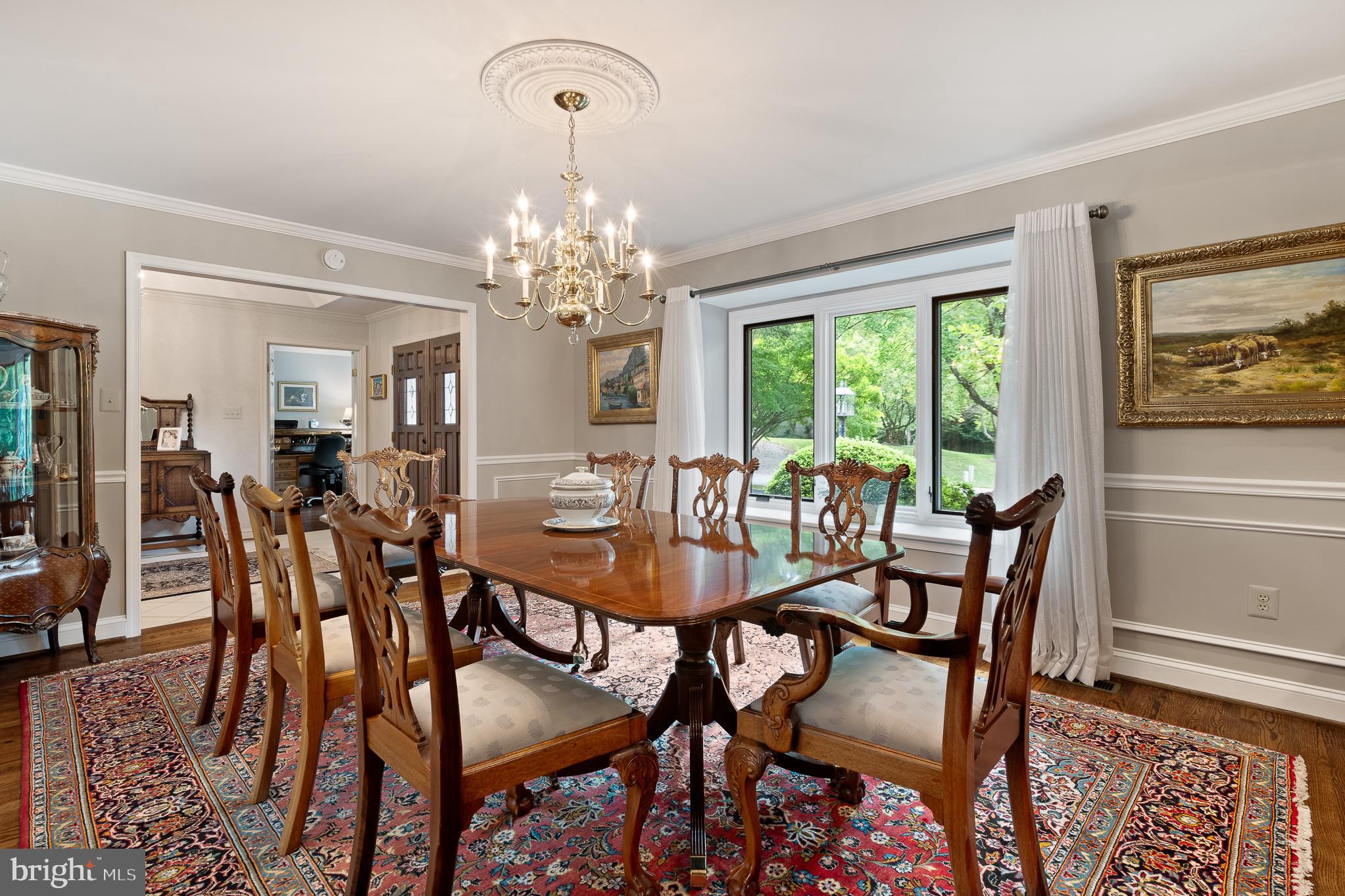 11301 Crossing Glen Court Potomac, MD 20854 - Photo 17 of 136 a view of a dining room with furniture window and outside view