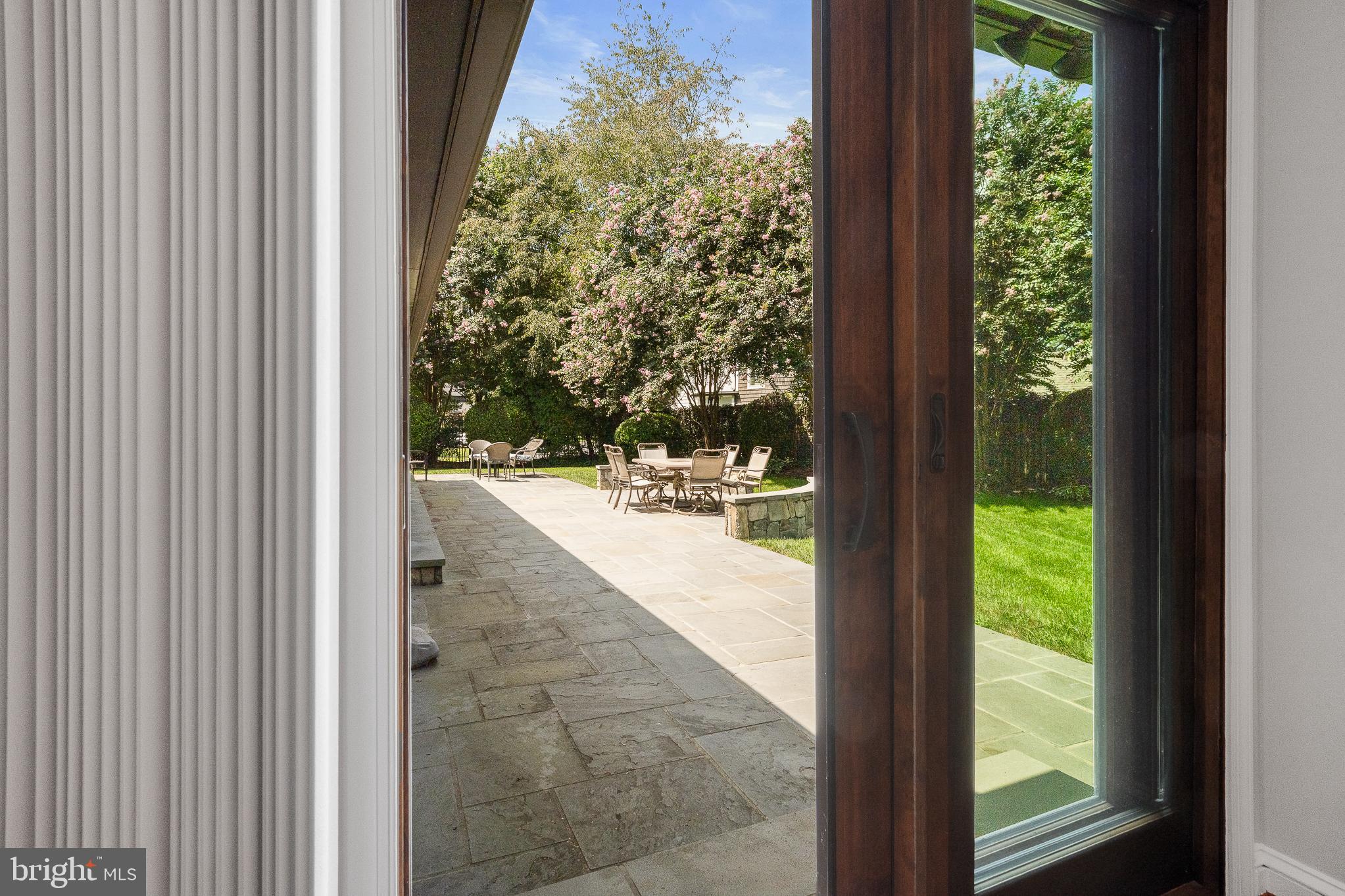 11301 Crossing Glen Court Potomac, MD 20854 - Photo 84 of 136 a view of a glass door with a yard from a window