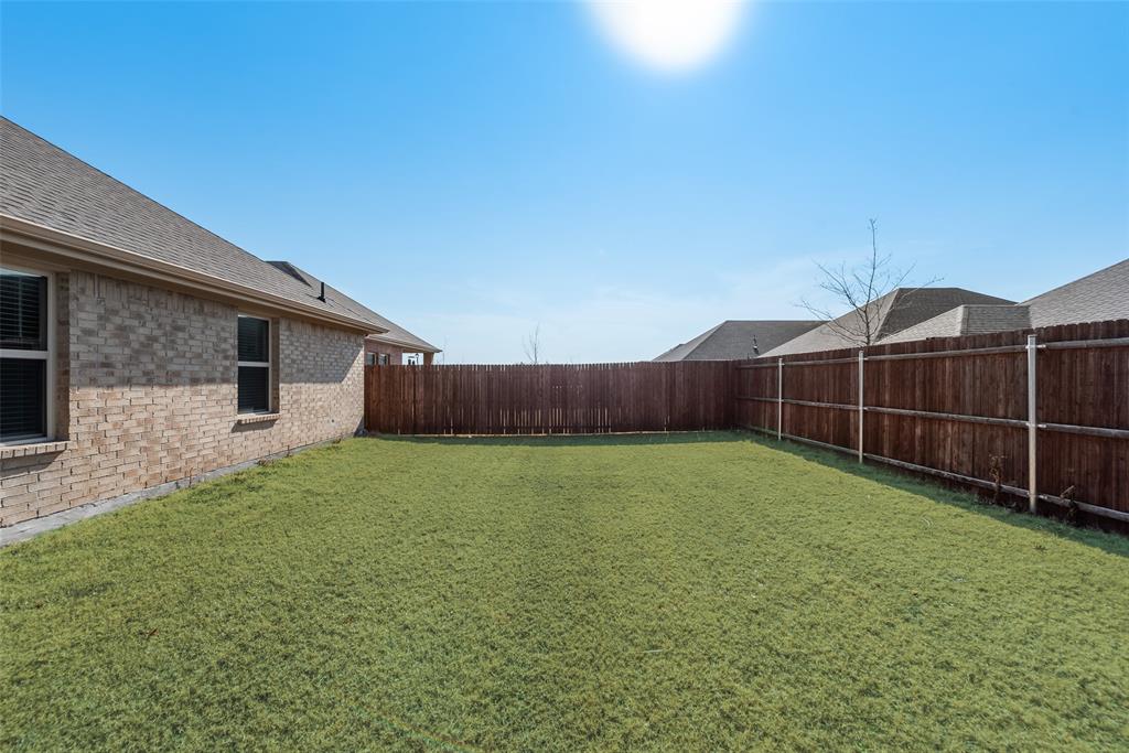 623 Sweet Dream Way Lavon, TX 75166 - Photo 18 of 21 a view of a backyard