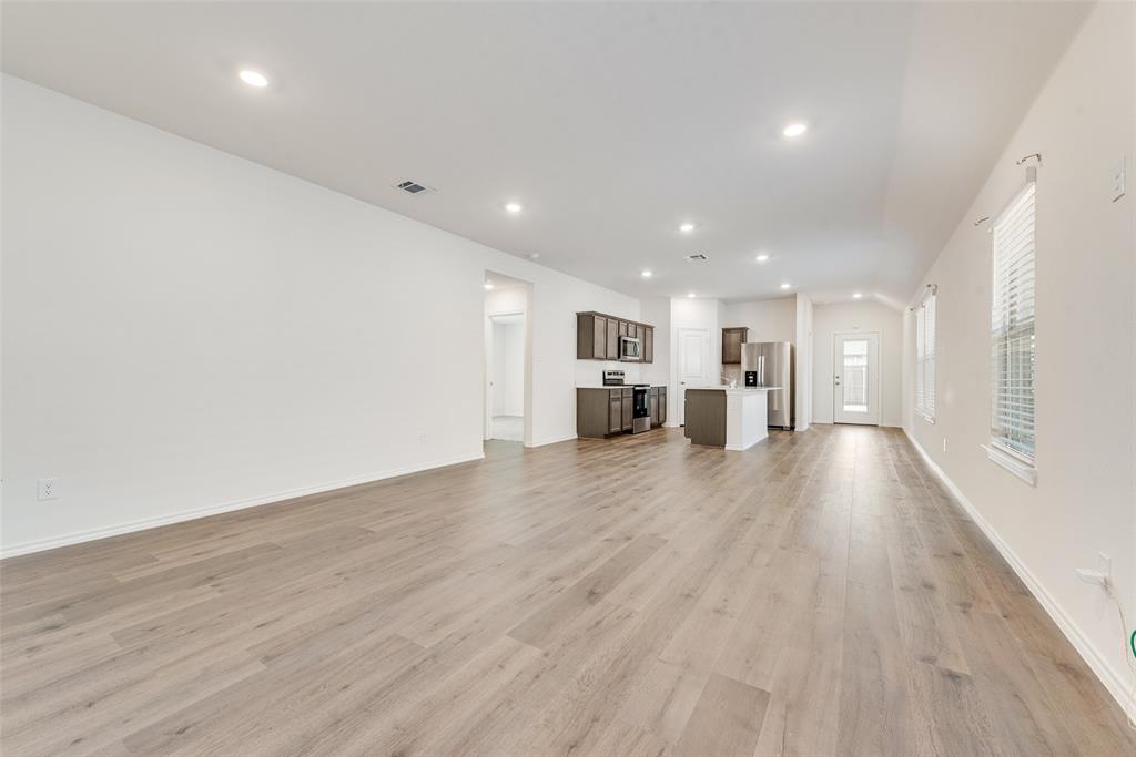 623 Sweet Dream Way Lavon, TX 75166 - Photo 7 of 21 a view of kitchen and a sink with wooden floor