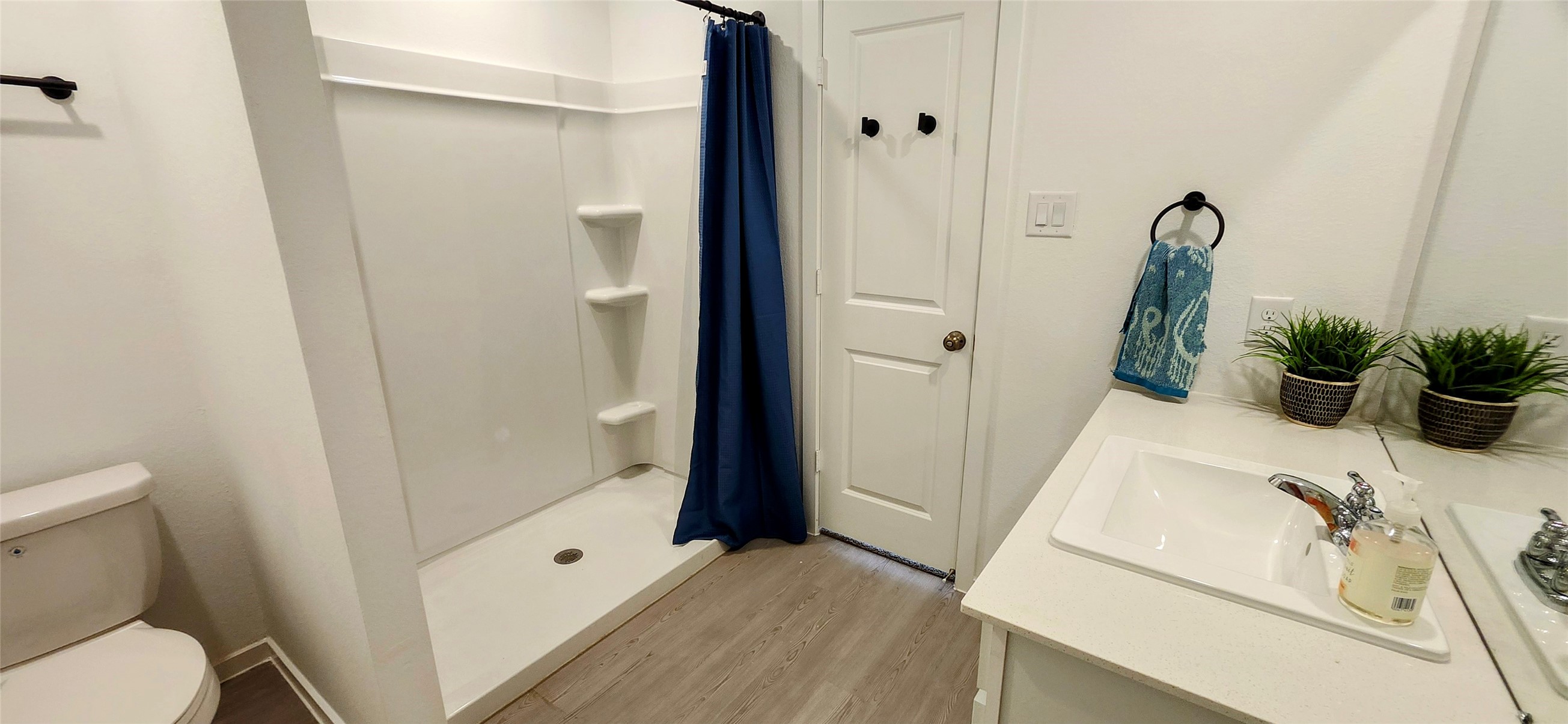 10288 Prairie Dunes Lane Cleveland, TX 77327 - Photo 8 of 15 a bathroom with a sink a toilet and shower