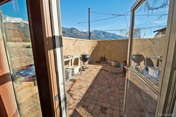a view of a living room with a balcony
