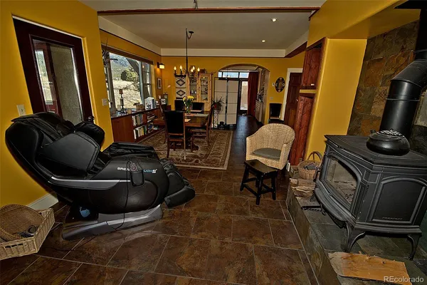 a room with lots of furniture and windows