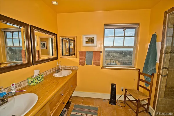 a bathroom with a shower and toilet