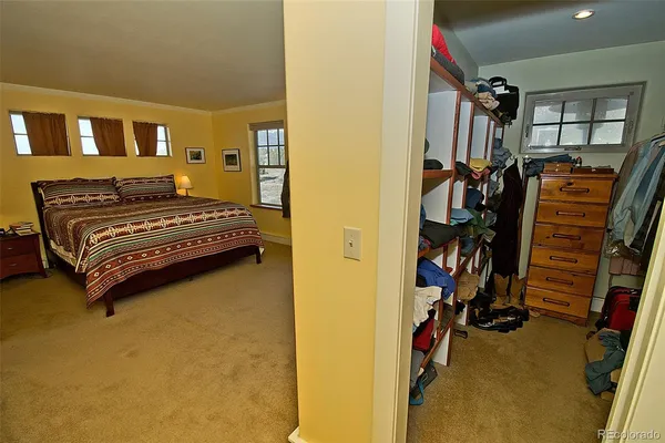 a view of a hallway with washer and dryer