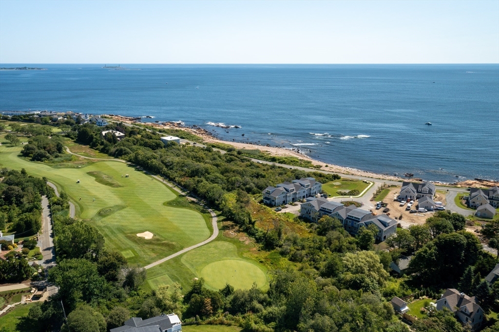 163 Atlantic Road, Unit 10 Gloucester, MA 01930 - Photo 1 of 23 a view of an ocean and beach
