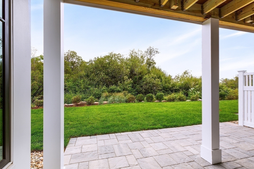 163 Atlantic Road, Unit 10 Gloucester, MA 01930 - Photo 21 of 23 a view of a garden from a window