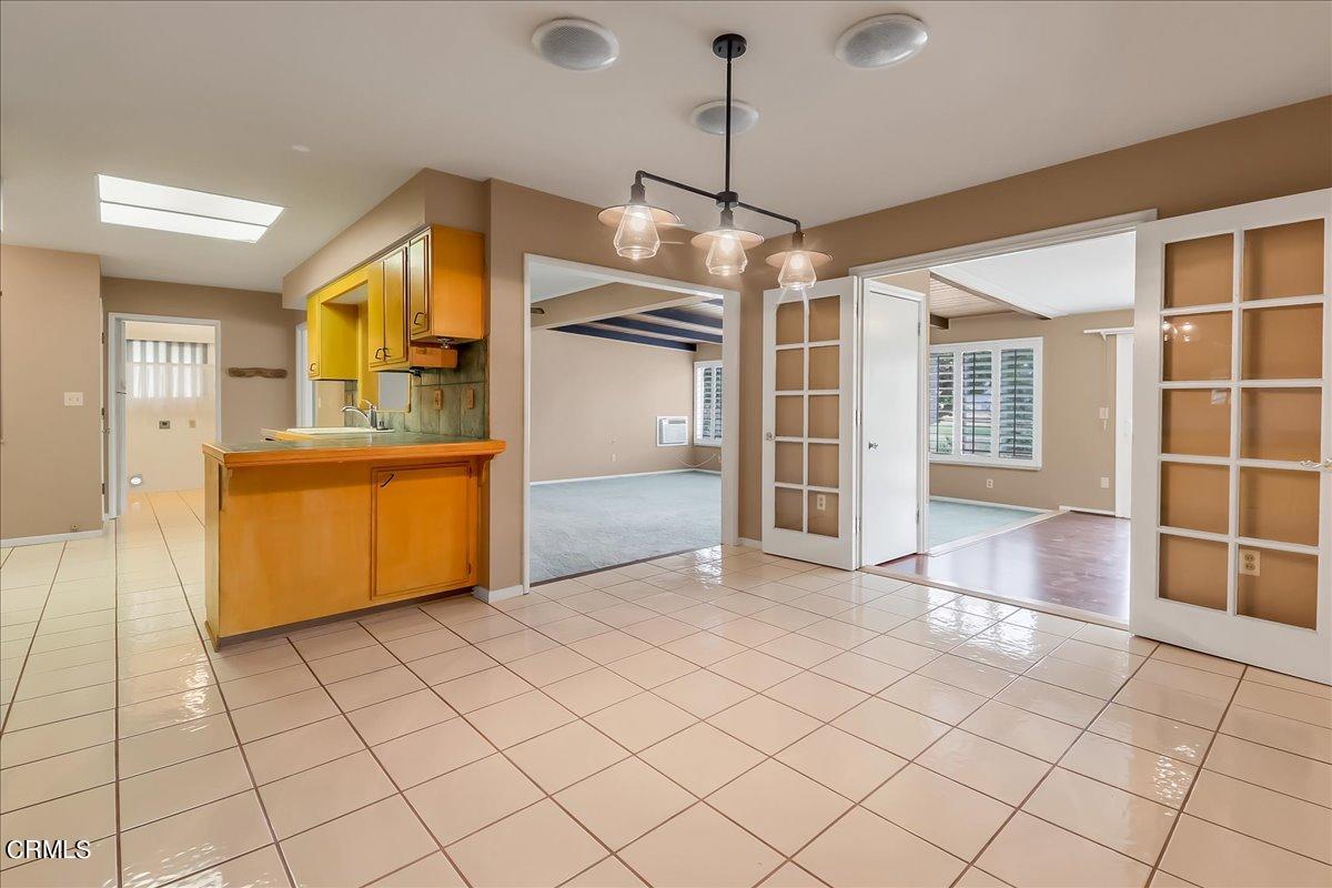 26204 Ridgemoor Road Menifee, CA 92586 - Photo 13 of 35 a view of a kitchen with cabinet and a stove top oven