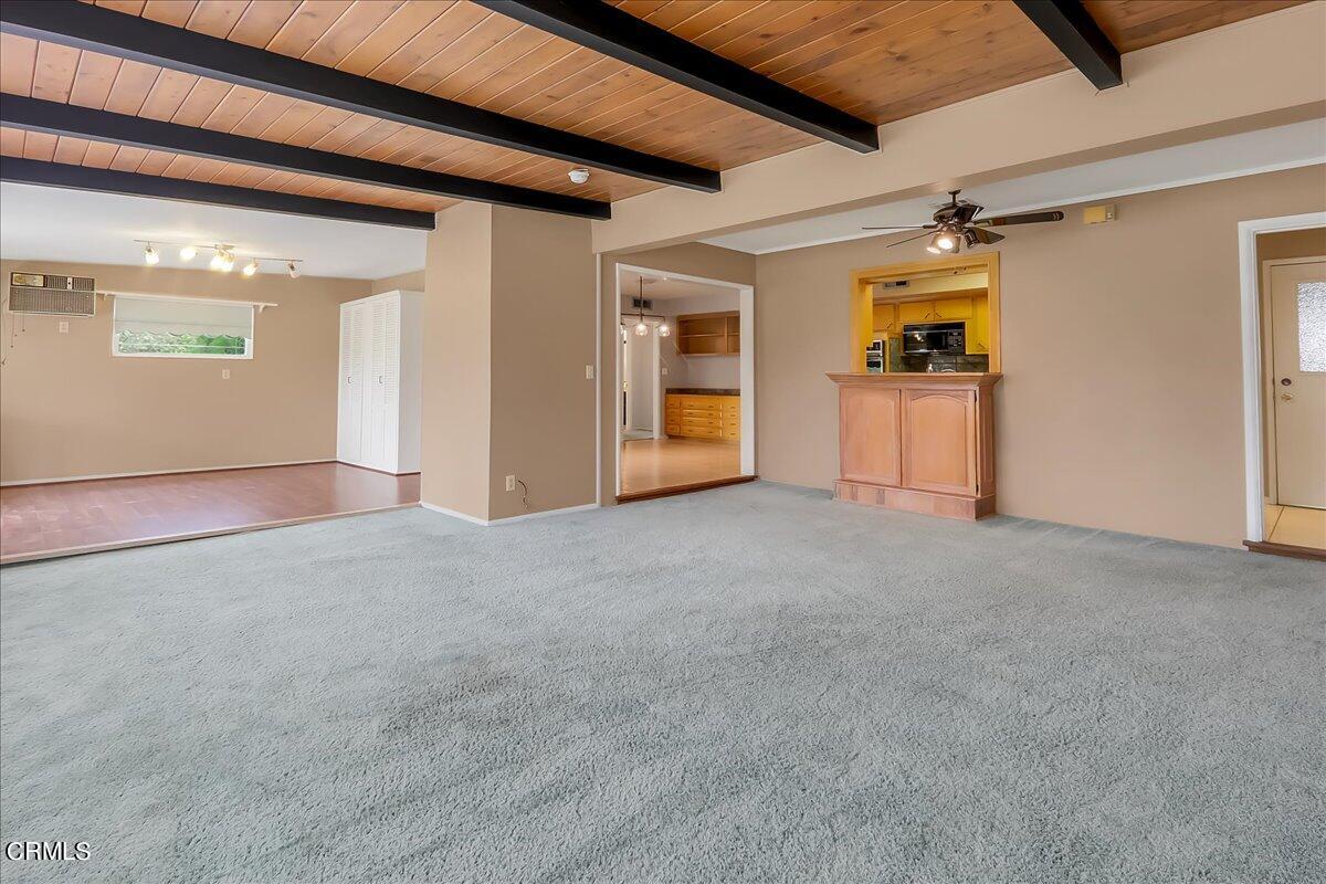 26204 Ridgemoor Road Menifee, CA 92586 - Photo 21 of 35 a view of empty room with wooden floor and windows