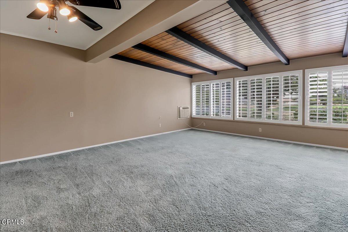 26204 Ridgemoor Road Menifee, CA 92586 - Photo 22 of 35 a view of an empty room with a window