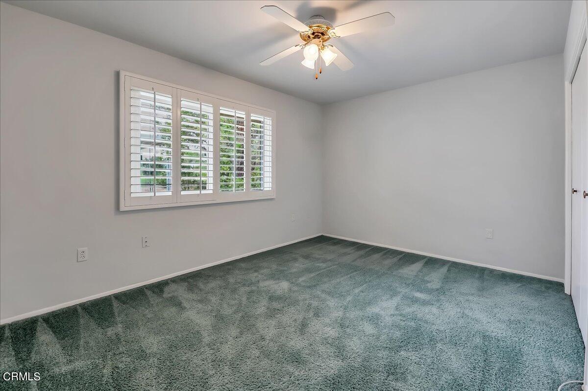 26204 Ridgemoor Road Menifee, CA 92586 - Photo 27 of 35 an empty room with a window