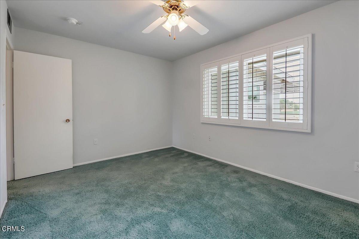 26204 Ridgemoor Road Menifee, CA 92586 - Photo 30 of 35 an empty room with a window