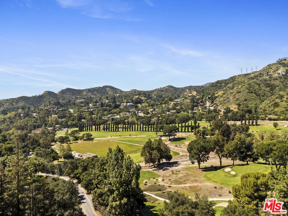 3275 Buckingham Road Glendale, CA 91206 - Photo 32 of 33 a view of a city with mountains in the background