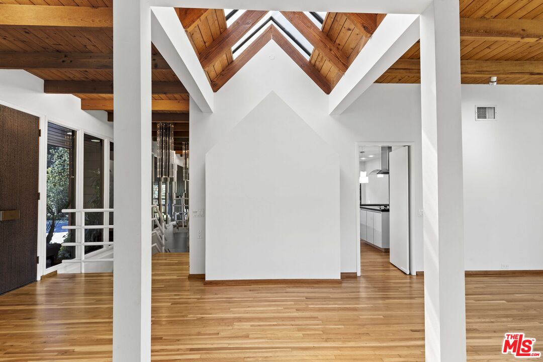 3275 Buckingham Road Glendale, CA 91206 - Photo 7 of 33 a view of a livingroom with wooden floor and staircase