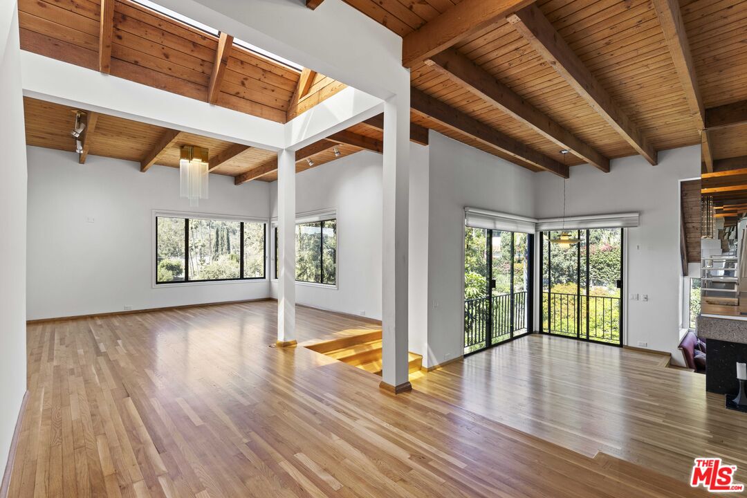 3275 Buckingham Road Glendale, CA 91206 - Photo 9 of 33 a view of empty room with wooden floor and fan