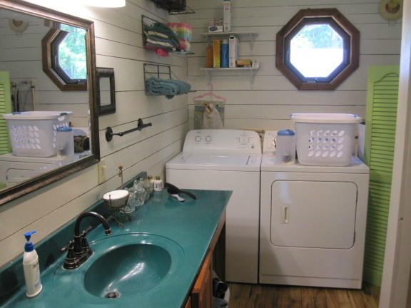 1405 Poor Farm Road Southeast Floyd, VA 24091 - Photo 16 of 46 a bathroom with a sink mirror and vanity