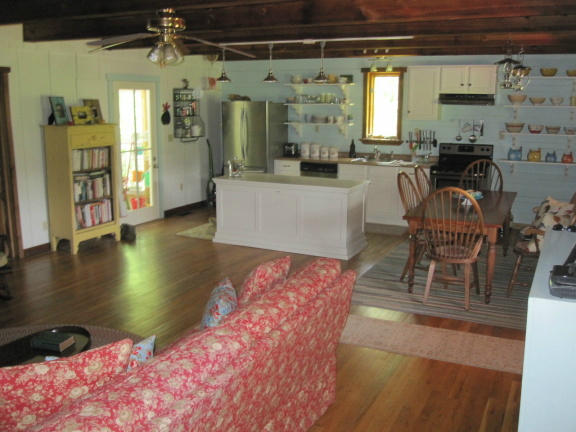 1405 Poor Farm Road Southeast Floyd, VA 24091 - Photo 18 of 46 a living room with furniture and a floor to ceiling window