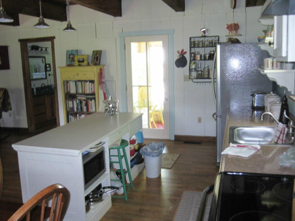 1405 Poor Farm Road Southeast Floyd, VA 24091 - Photo 19 of 46 a room with furniture and a flat screen tv