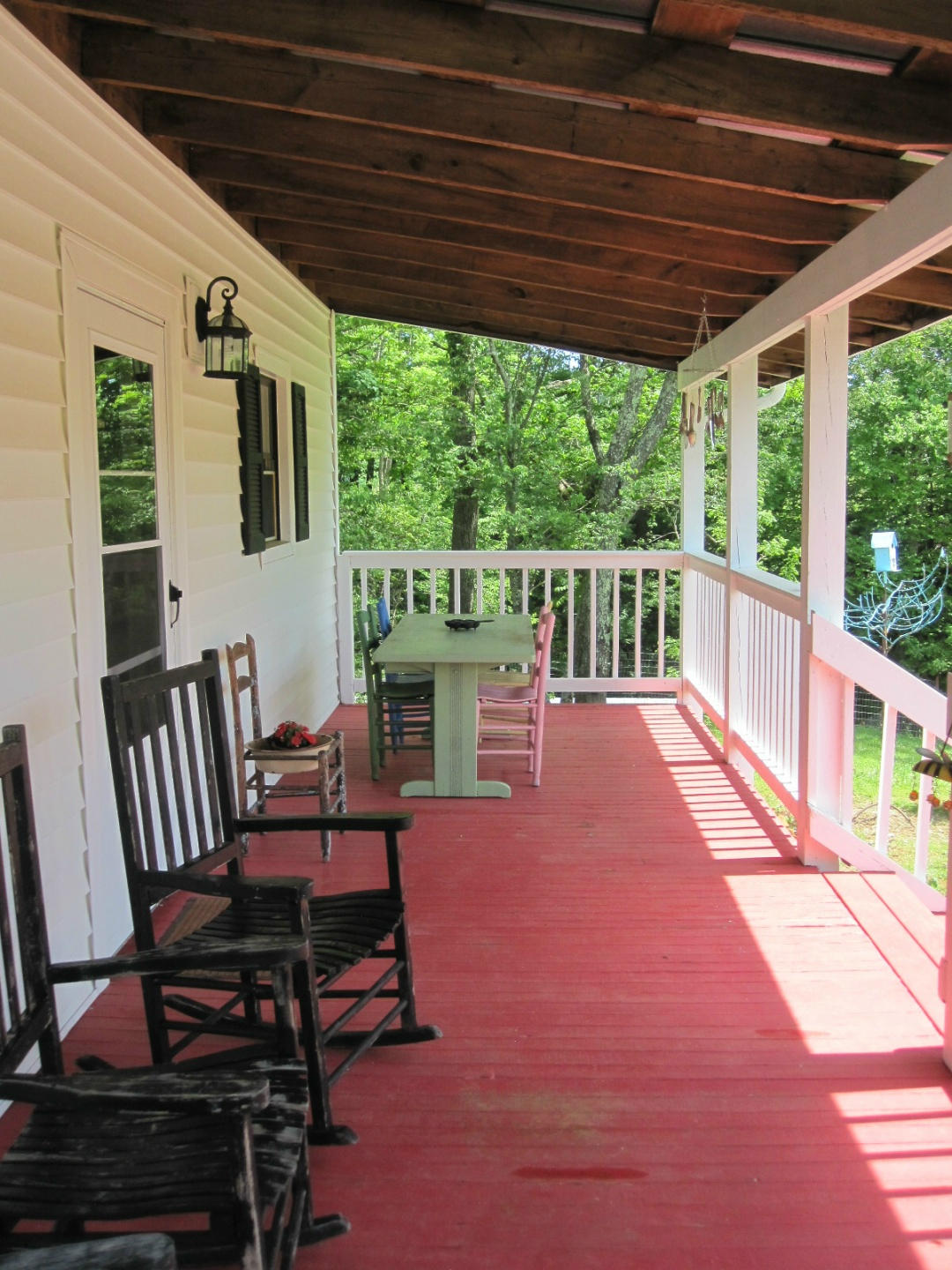 1405 Poor Farm Road Southeast Floyd, VA 24091 - Photo 31 of 46 a balcony with furniture and wooden floor