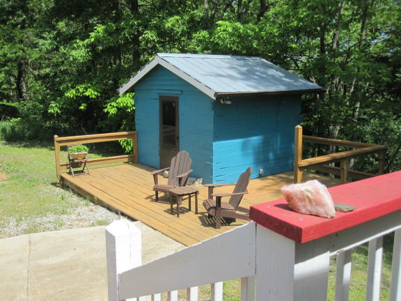 1405 Poor Farm Road Southeast Floyd, VA 24091 - Photo 37 of 46 a terrace with outdoor seating and trees