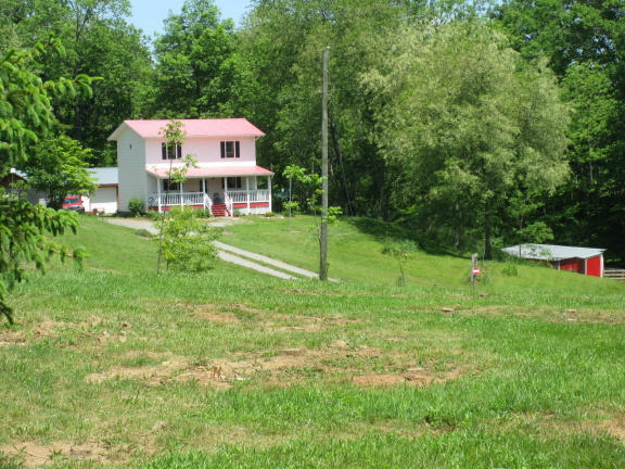 1405 Poor Farm Road Southeast Floyd, VA 24091 - Photo 46 of 46 a view of a house with backyard and garden