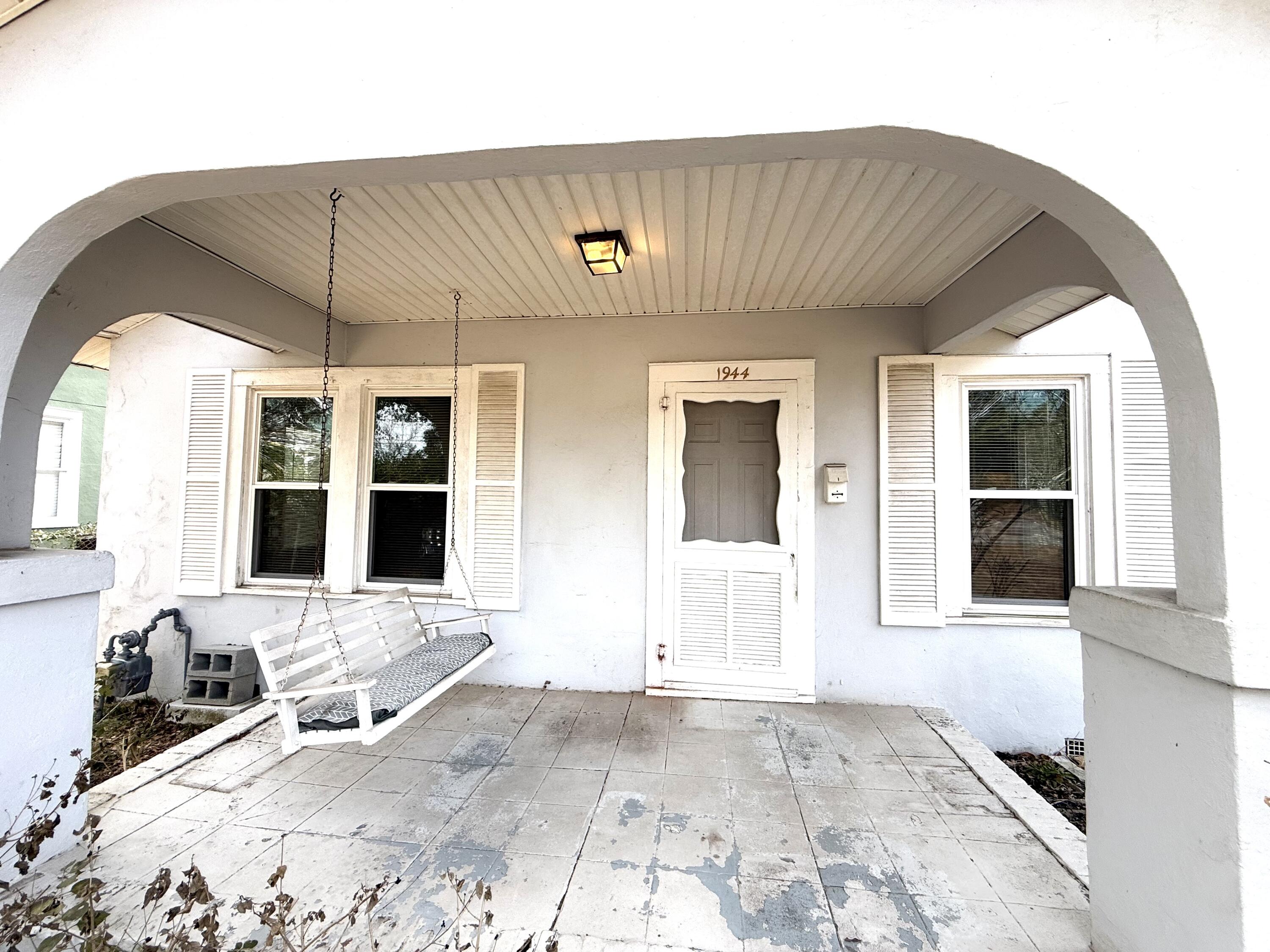 1944 Warren Street Augusta, GA 30904 - Photo 2 of 14 Covered Rocking Chair Porch