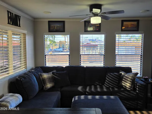 a living room with furniture and a window