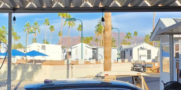 a view of living room with furniture and window