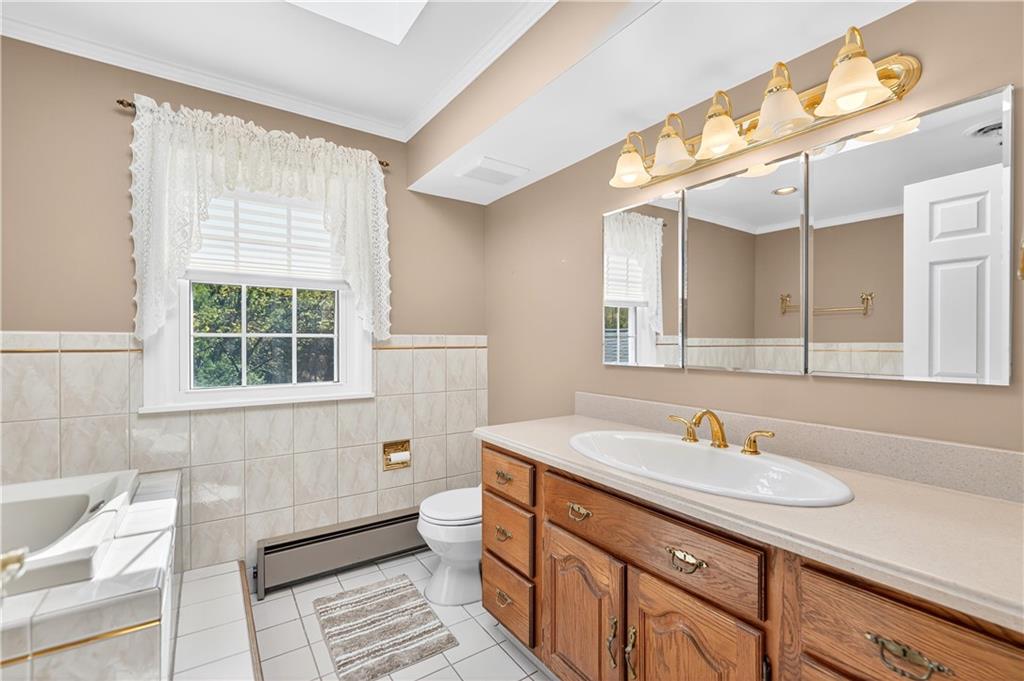 1801 McCorkle Road South Park, PA 15129 - Photo 13 of 49 a bathroom with a sink and a window