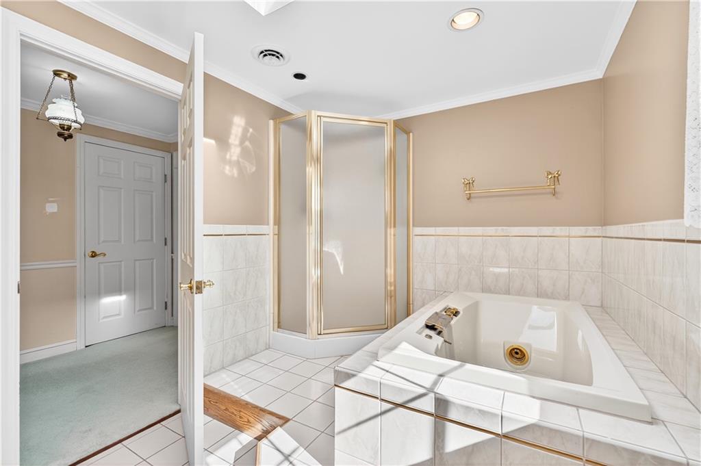 1801 McCorkle Road South Park, PA 15129 - Photo 14 of 49 a bathroom with a tub and shower