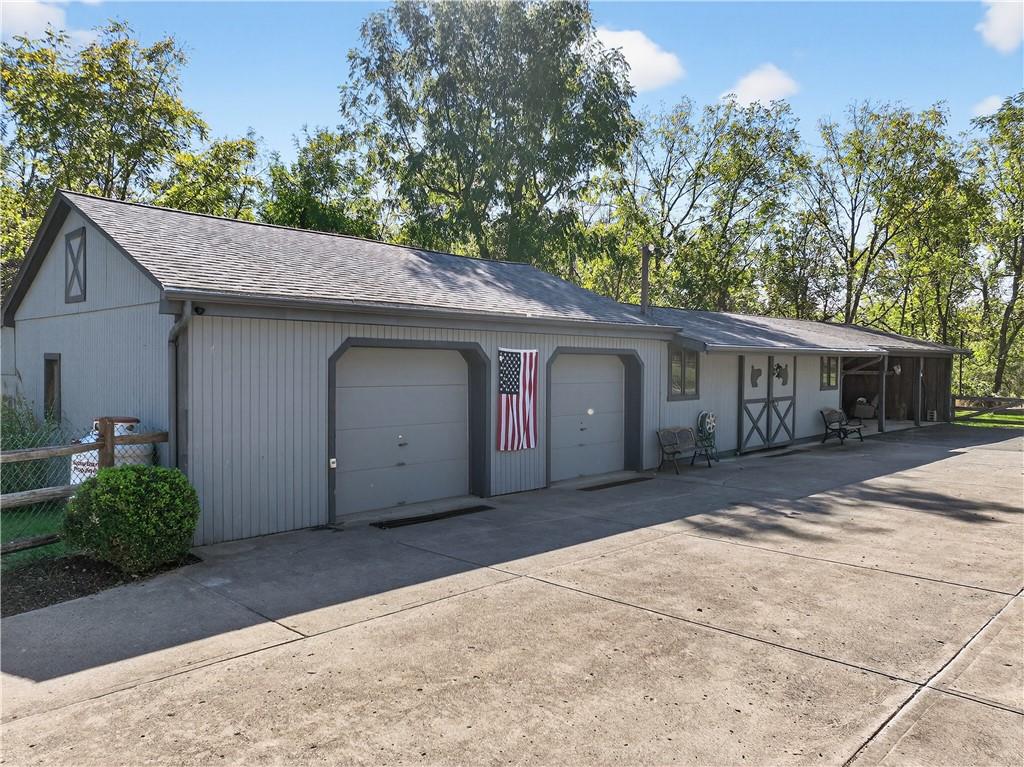 1801 McCorkle Road South Park, PA 15129 - Photo 23 of 49 a front view of a house with garden