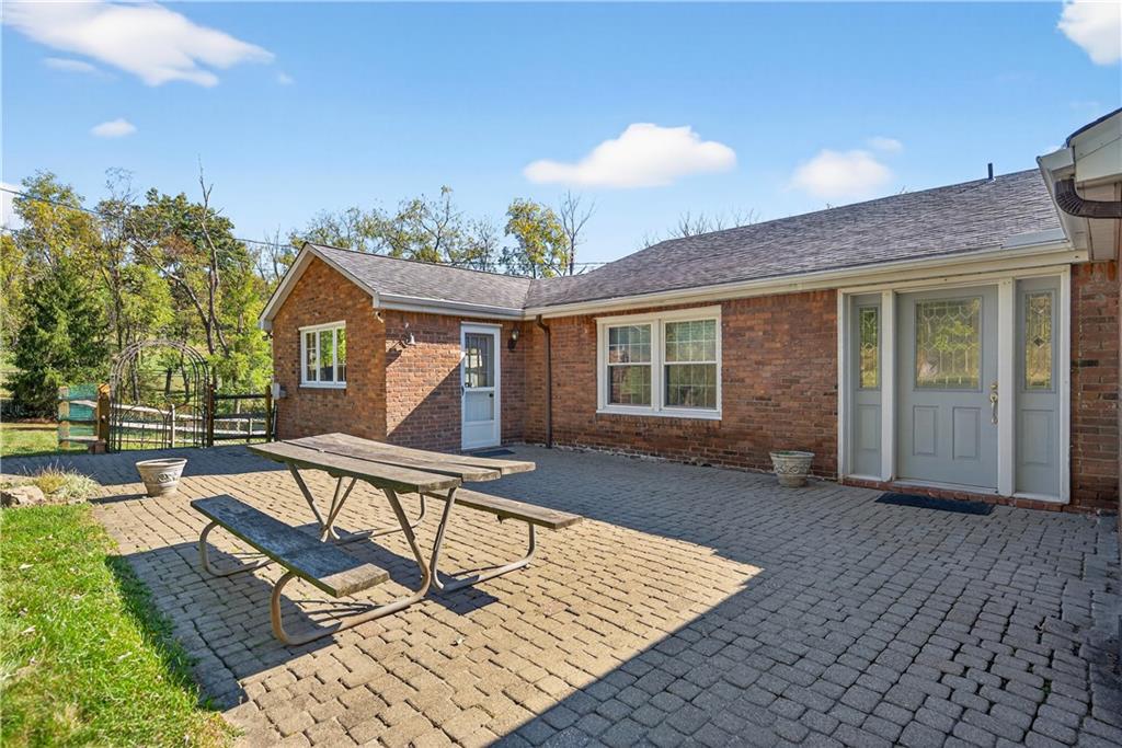 1801 McCorkle Road South Park, PA 15129 - Photo 30 of 49 a view of a house with backyard and sitting area